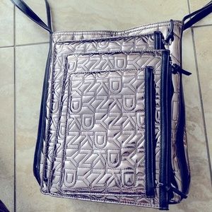 “DKNY” oversized 4 piece travel purse with 3 different sized zipper bags!